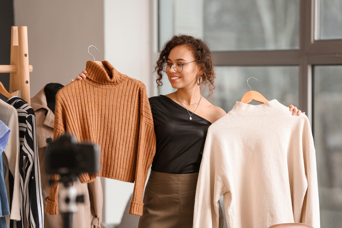 Female Clothes Stylist Working in Office